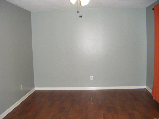 1526 Pine Manor Dr, Arkadelphia, AR 71923 - empty room with baseboards, ceiling fan, and wood finished floors