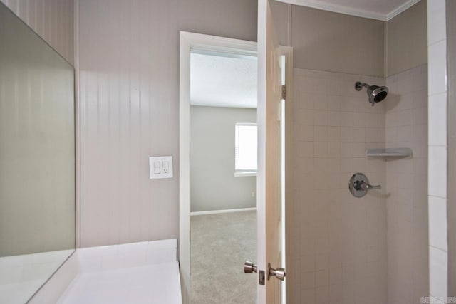 full bath with tiled shower