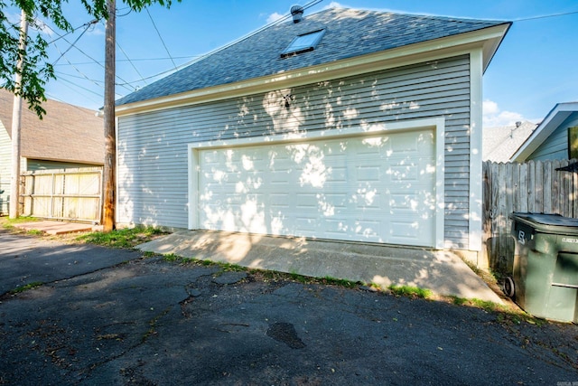 detached garage with fence