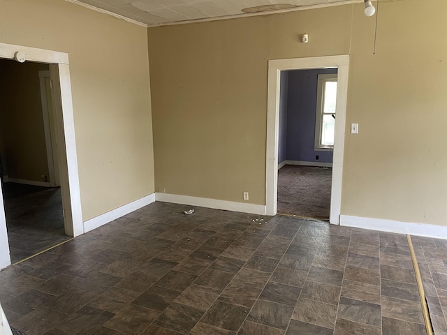 empty room with baseboards