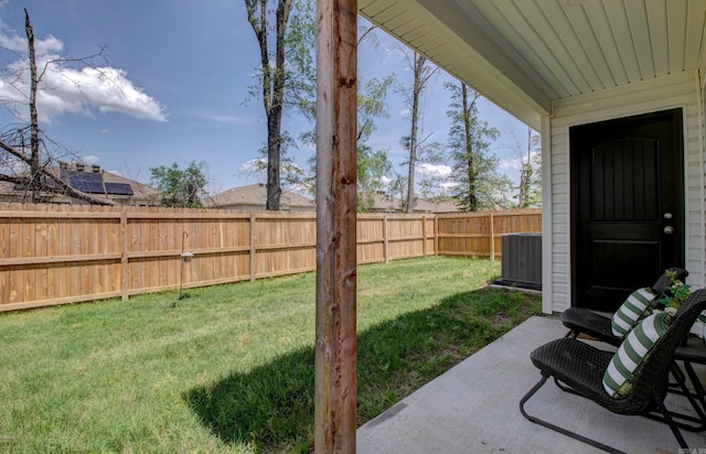 view of yard featuring a fenced backyard and cooling unit