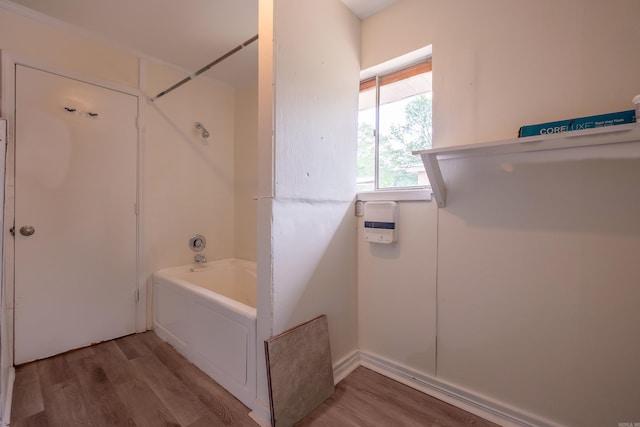 full bathroom with wood finished floors and bathtub / shower combination