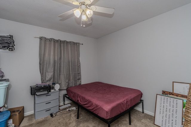 bedroom featuring carpet floors, baseboards, and ceiling fan