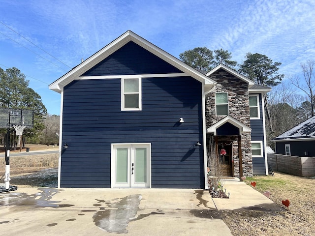view of front of property featuring stone siding