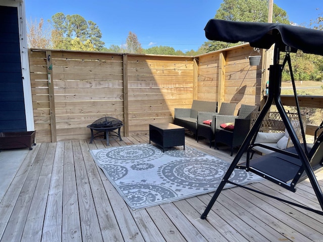 deck featuring an outdoor living space