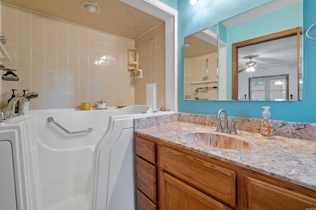 15 Tarifa Ln, Hot Springs Village, AR 71909 - full bath with vanity, a ceiling fan, and a washtub