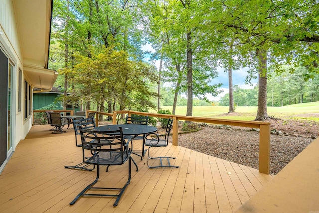 15 Tarifa Ln, Hot Springs Village, AR 71909 - wooden deck with outdoor dining area