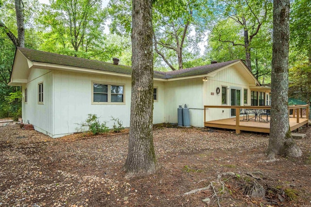 15 Tarifa Ln, Hot Springs Village, AR 71909 - rear view of property featuring roof with shingles and a wooden deck