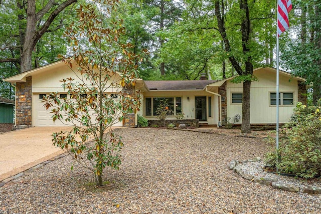 15 Tarifa Ln, Hot Springs Village, AR 71909 - single story home with an attached garage, driveway, and stone siding