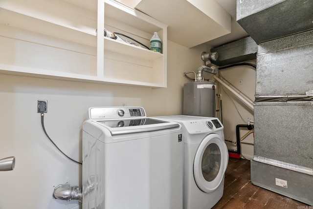 laundry area featuring gas water heater, laundry area, heating unit, separate washer and dryer, and dark wood-type flooring