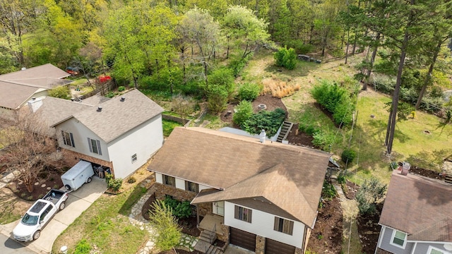 drone / aerial view with a forest view
