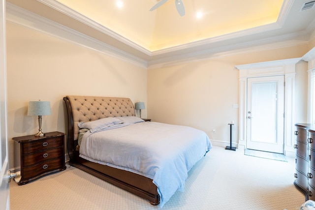 carpeted bedroom with crown molding, ceiling fan, and visible vents