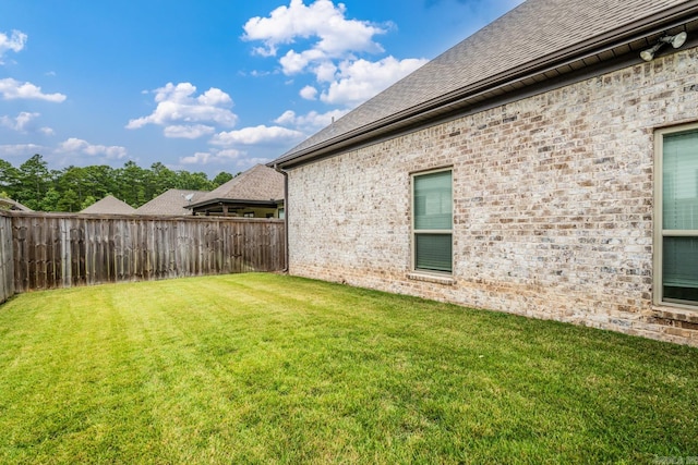 view of yard featuring a fenced backyard