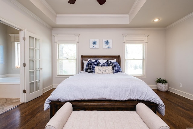 bedroom featuring multiple windows, ornamental molding, and dark wood-style floors