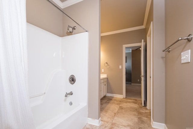 full bathroom featuring vanity, ornamental molding, baseboards, and shower / bath combo