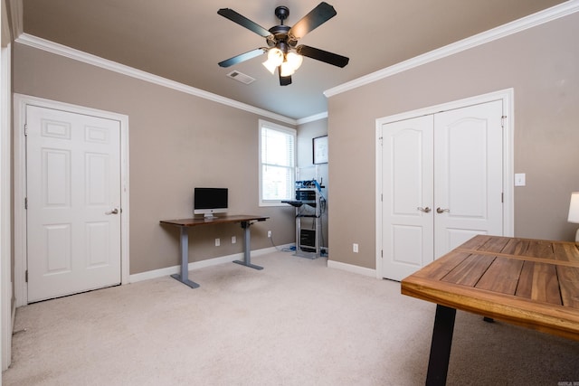 office with ceiling fan, visible vents, crown molding, baseboards, and light carpet