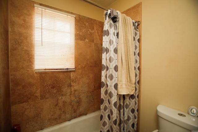 6606 Silver Ct, Little Rock, AR 72209 - bathroom featuring toilet and shower / tub combo with curtain