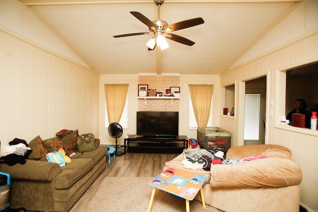 6606 Silver Ct, Little Rock, AR 72209 - living room with crown molding, a ceiling fan, vaulted ceiling, and wood finished floors