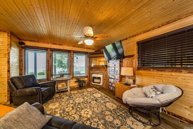 4 Long Hill Rd, Higden, AR 72067 - living room featuring wooden walls, wood ceiling, a ceiling fan, and hardwood / wood-style floors