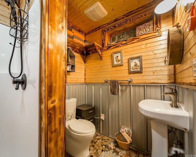 4 Long Hill Rd, Higden, AR 72067 - half bath featuring wooden walls, wooden ceiling, toilet, and a sink