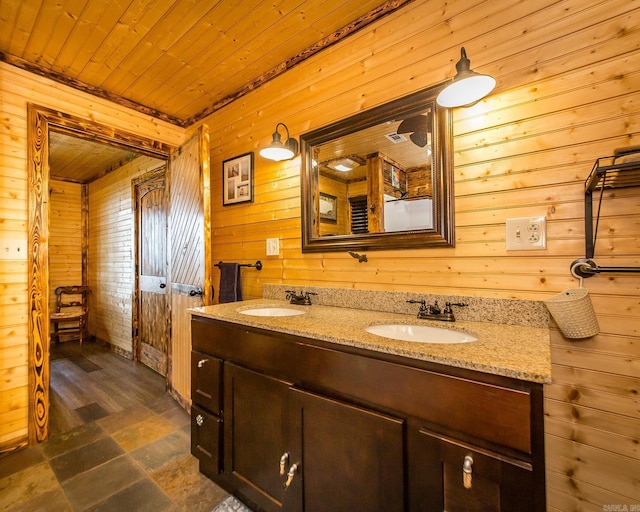 4 Long Hill Rd, Higden, AR 72067 - bathroom with a sink, wooden ceiling, and wooden walls