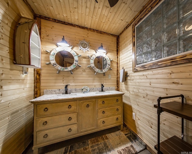 4 Long Hill Rd, Higden, AR 72067 - bathroom featuring wooden walls, wood ceiling, double vanity, and a sink