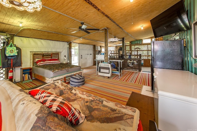 4 Long Hill Rd, Higden, AR 72067 - bedroom featuring freestanding refrigerator, wood ceiling, carpet flooring, and multiple windows
