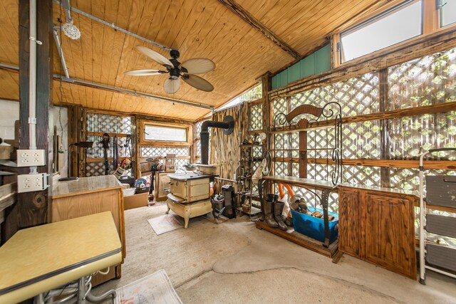 4 Long Hill Rd, Higden, AR 72067 - misc room with a wood stove, plenty of natural light, a ceiling fan, wooden ceiling, and vaulted ceiling