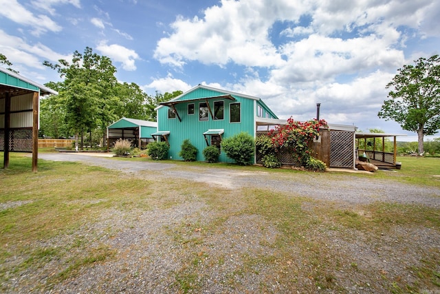 4 Long Hill Rd, Higden, AR 72067 - view of front facade featuring a detached carport and driveway