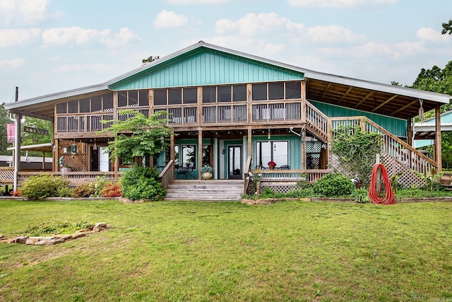 4 Long Hill Rd, Higden, AR 72067 - back of property featuring stairway, a lawn, a wooden deck, and a sunroom