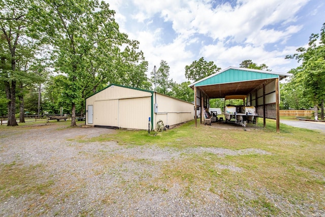 4 Long Hill Rd, Higden, AR 72067 - exterior space with fence, an outbuilding, an outdoor structure, and a carport