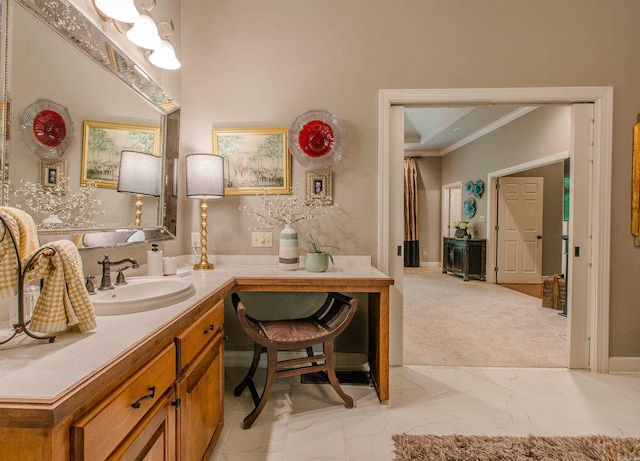 bathroom featuring crown molding, marble finish floor, and vanity