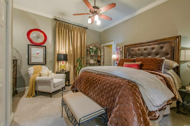 carpeted bedroom featuring crown molding, baseboards, and ceiling fan
