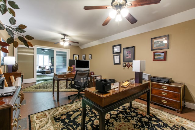 office space featuring baseboards and a ceiling fan