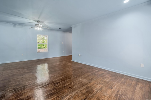 unfurnished room with crown molding, ceiling fan, and baseboards