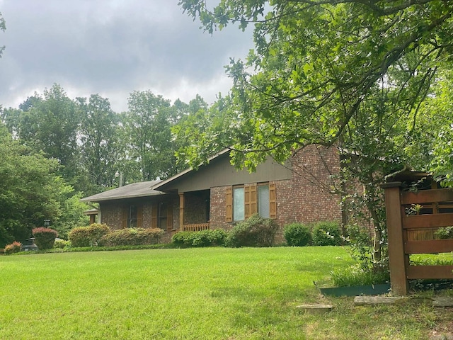874 Stacy Spgs, Heber Springs, AR 72543 - view of front of home featuring brick siding and a front yard