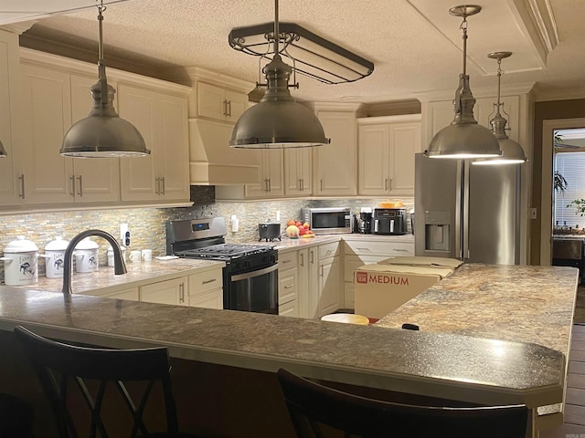874 Stacy Spgs, Heber Springs, AR 72543 - kitchen with appliances with stainless steel finishes, wall chimney exhaust hood, backsplash, a breakfast bar, and ornamental molding