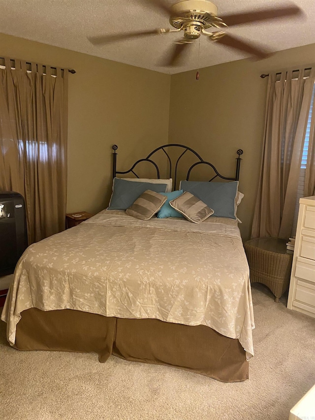 874 Stacy Spgs, Heber Springs, AR 72543 - bedroom featuring light colored carpet, a textured ceiling, and ceiling fan