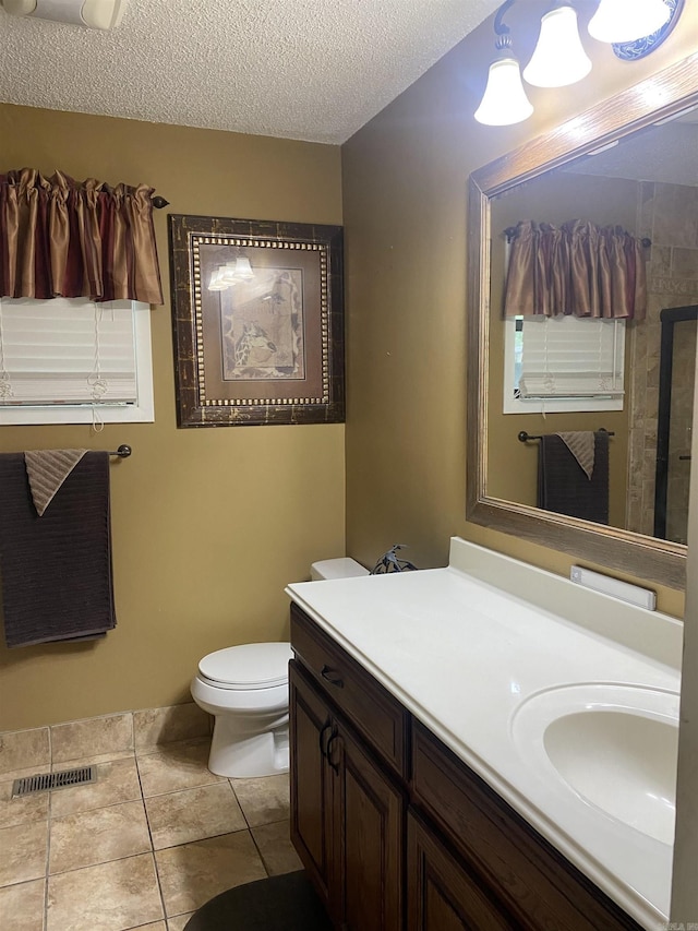 874 Stacy Spgs, Heber Springs, AR 72543 - bathroom with vanity, toilet, tile patterned floors, and a textured ceiling