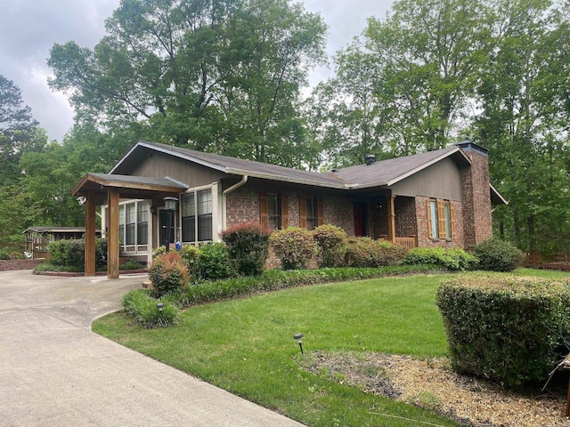 874 Stacy Spgs, Heber Springs, AR 72543 - ranch-style house with a front yard, a chimney, concrete driveway, and brick siding
