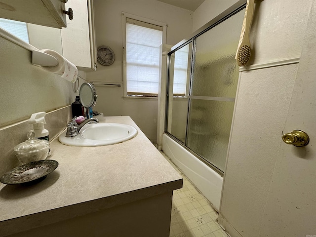 1519 S Oak St, Little Rock, AR 72204 - full bath featuring vanity, enclosed tub / shower combo, and tile patterned floors