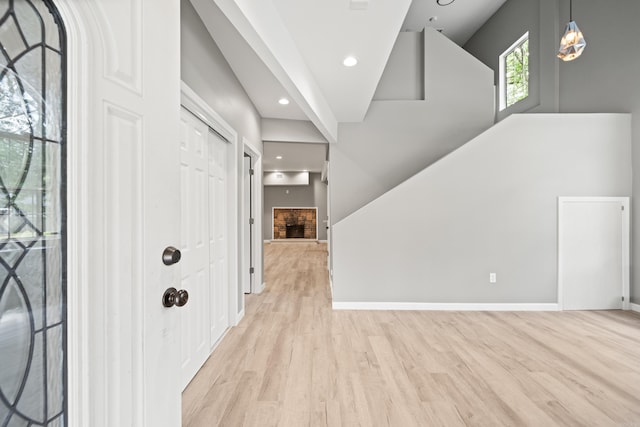 609 S St, Hot Springs, AR 71913 - foyer entrance featuring a fireplace, recessed lighting, baseboards, and light wood-type flooring