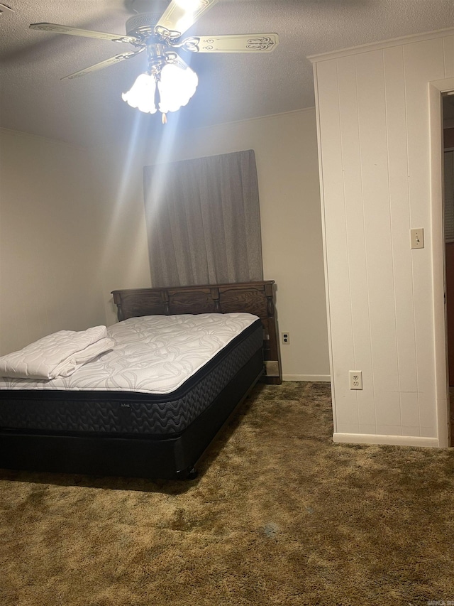 carpeted bedroom featuring a ceiling fan