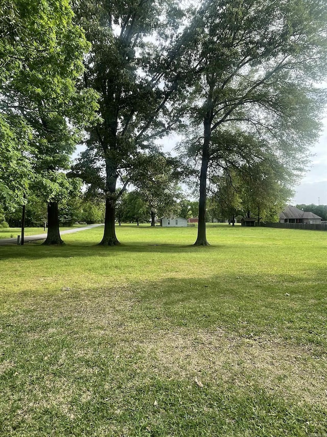 view of community featuring a yard