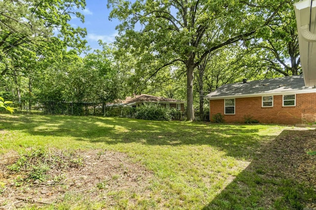 view of yard featuring fence