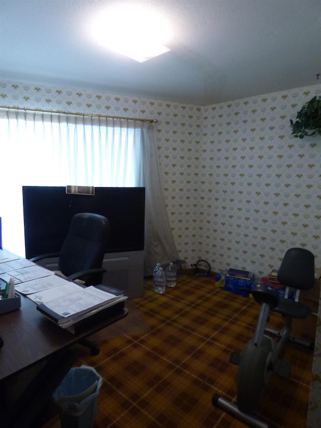 home office featuring wallpapered walls