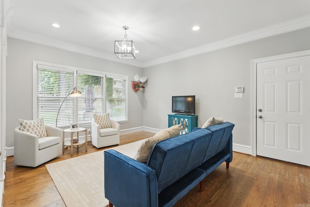 4109 Valley View Dr, Little Rock, AR 72212 - living room featuring baseboards, an inviting chandelier, ornamental molding, and wood finished floors