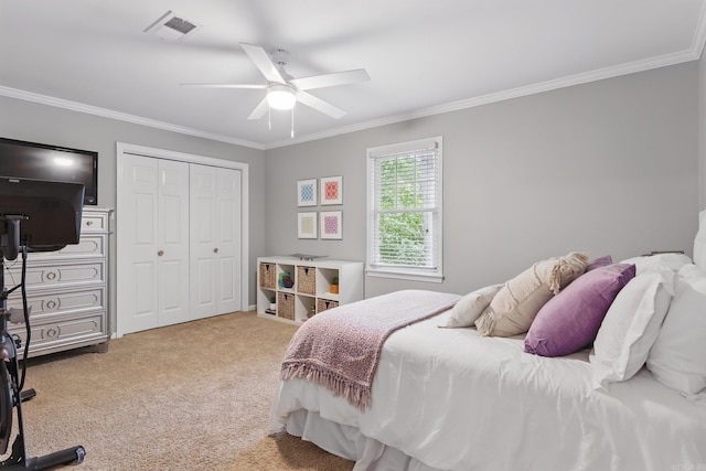 4109 Valley View Dr, Little Rock, AR 72212 - bedroom with visible vents, ornamental molding, carpet floors, a closet, and ceiling fan