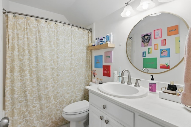 4109 Valley View Dr, Little Rock, AR 72212 - bathroom featuring vanity, toilet, and lofted ceiling