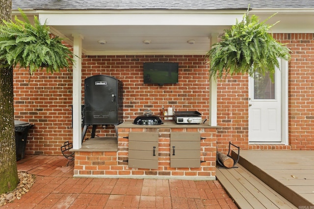 4109 Valley View Dr, Little Rock, AR 72212 - exterior space with a wood stove and brick siding